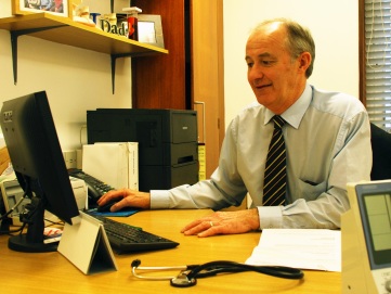 Graeme Crawford at desk